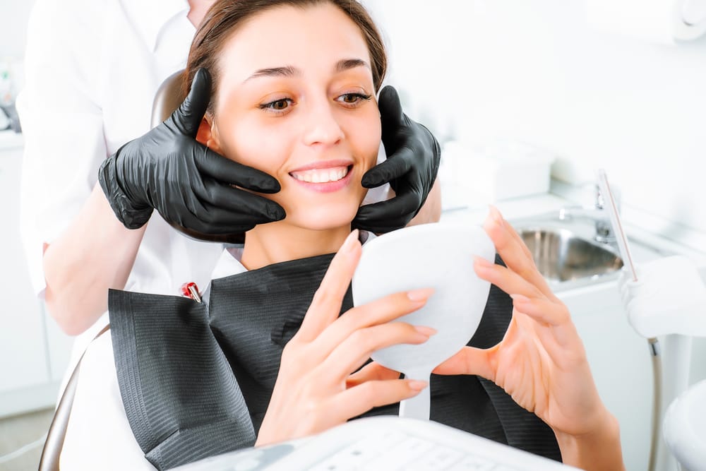 Enhance your smile’s beauty and strength with custom-fitted dental crowns. Enjoy natural-looking, durable results - Dental Crowns in Okemos.